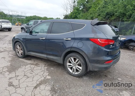 2013 Hyundai Santa Fe Sport 2.0T z USA, uszkodzony, nr VIN 5XYZWDLA4DG031060